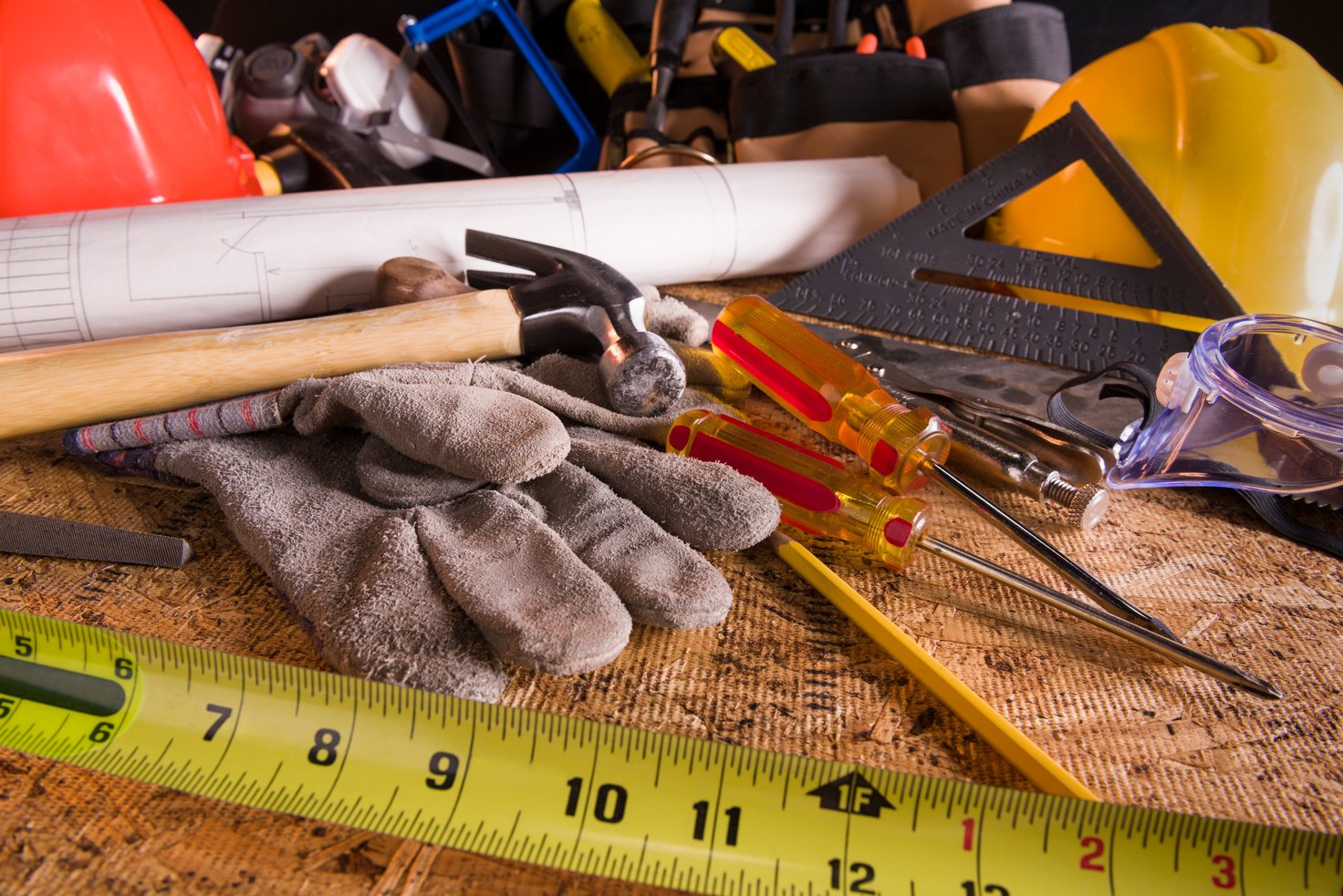 Construction hand tools and blueprints